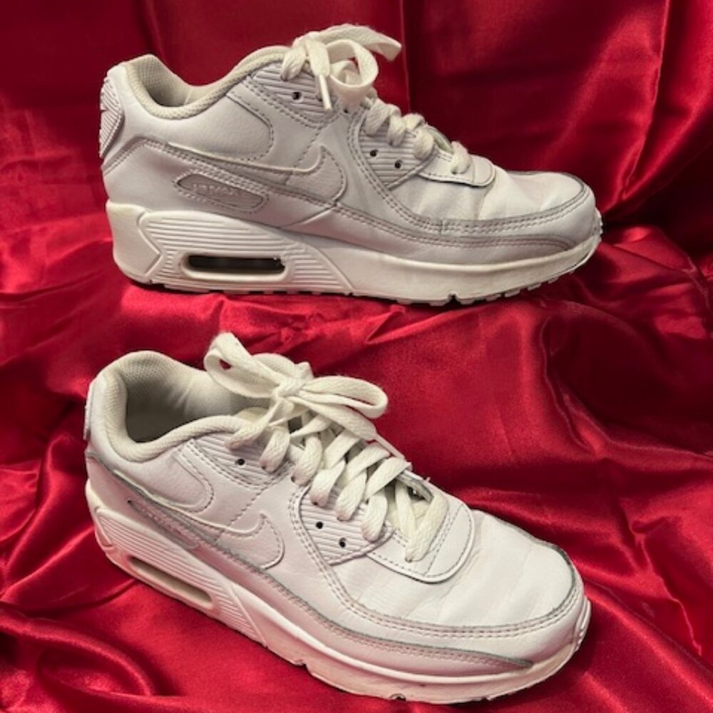 Nike Air Max 90, specifically the "Triple White" colorway. Kids Size 5Y